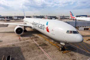 American Airlines plane parked at the gate at an airport.