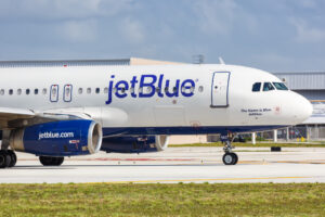 A JetBlue airplane parked on the tarmac
