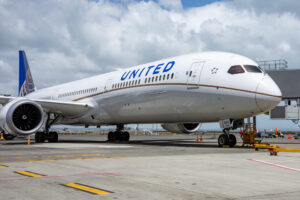 United Airlines flight parked at an airport gate.