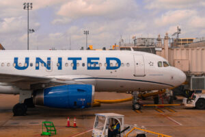 A United Airlines Airbus parked at the gate